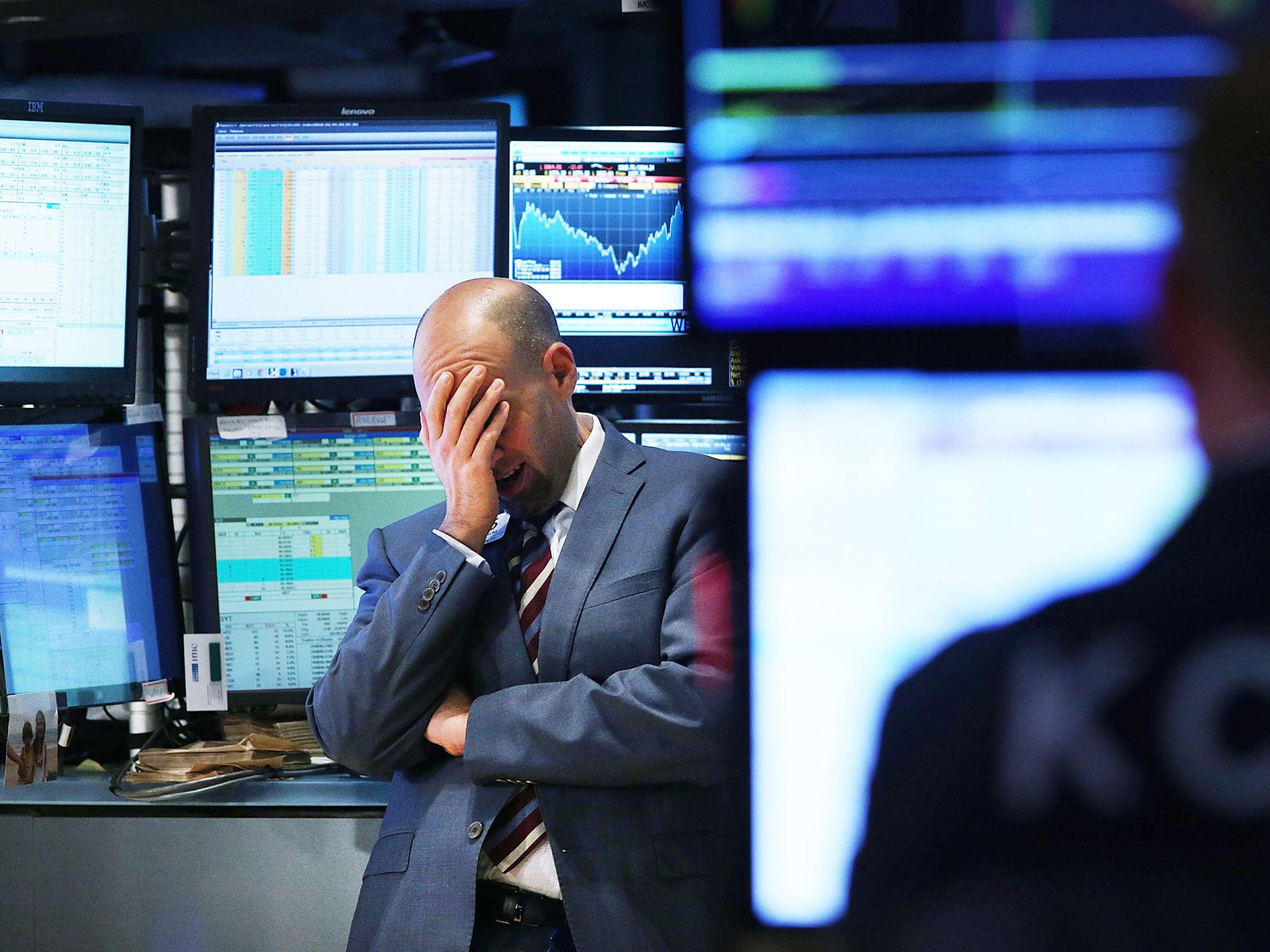 A trader works on the floor of the New York Stock Exchange