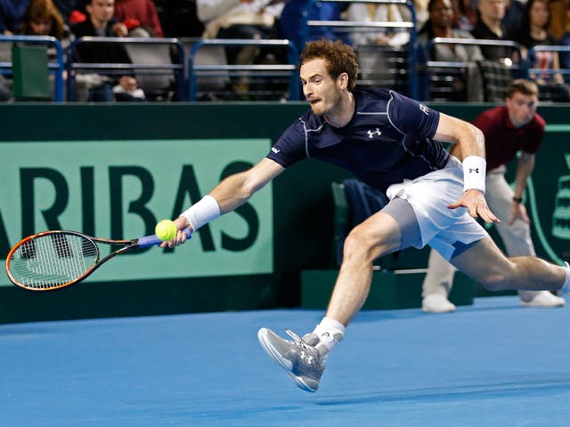 Andy Murray at full stretch against Japan’s Kei Nishikori