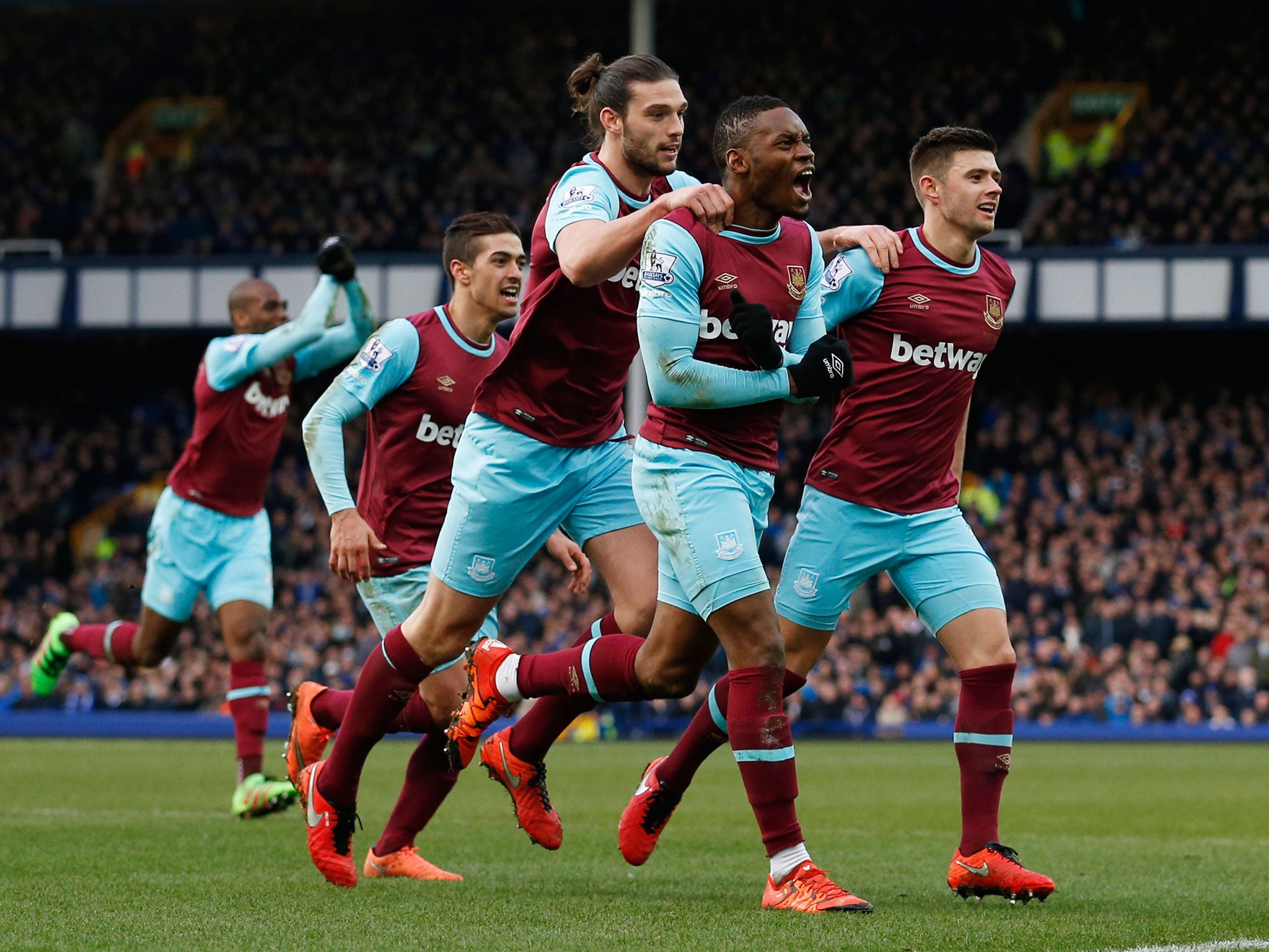 Diafra Sakho celebrates with his team-mates after scoring West Ham’s second goal at Everton