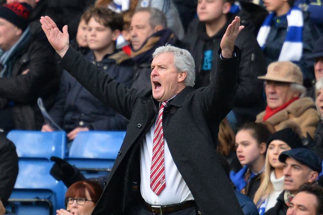 Stoke City's manager Mark Hughes gestures on the touchline during the match between Chelsea and Stoke City at Stamford Bridge