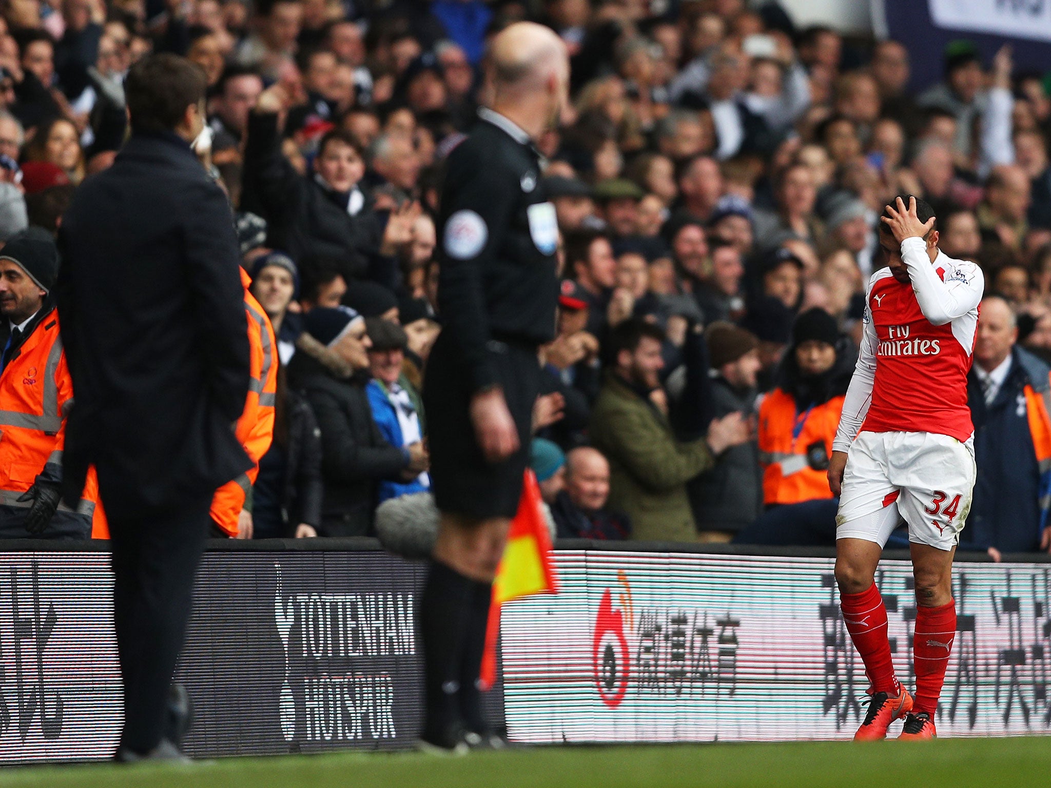 Francis Coquelin walks off the White Hart Lane pitch after being sent-off