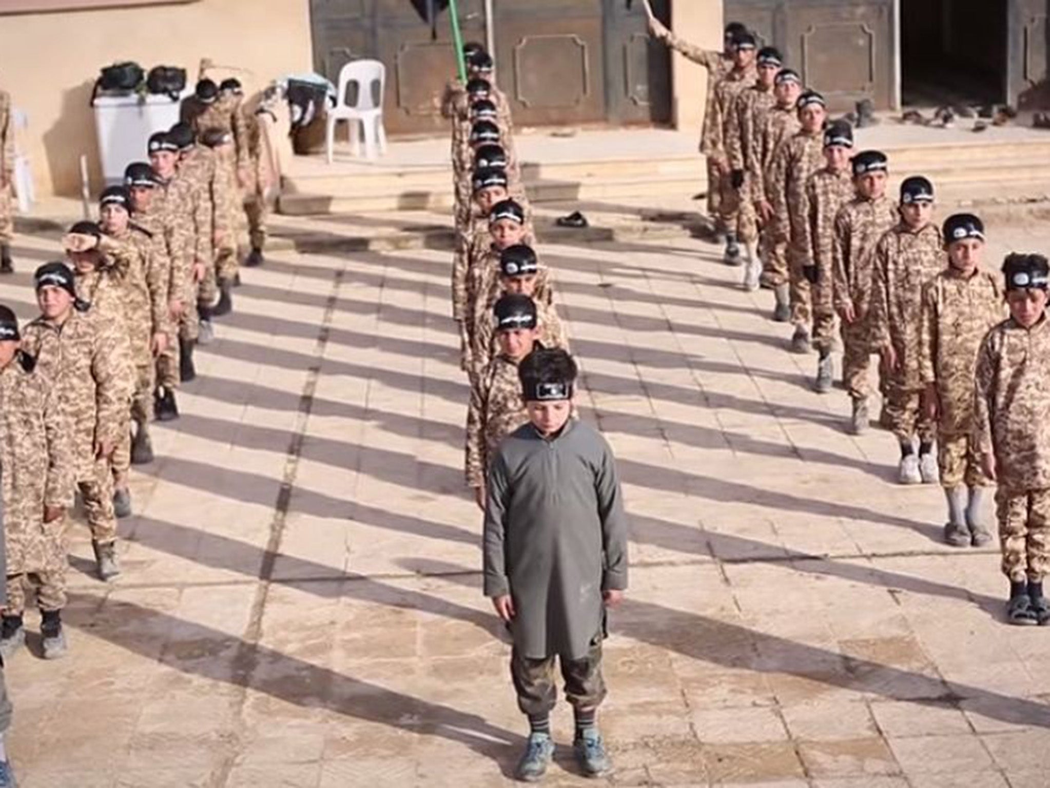 &#13;
Children at an Isis training camp for its 'cubs of the Caliphate'&#13;