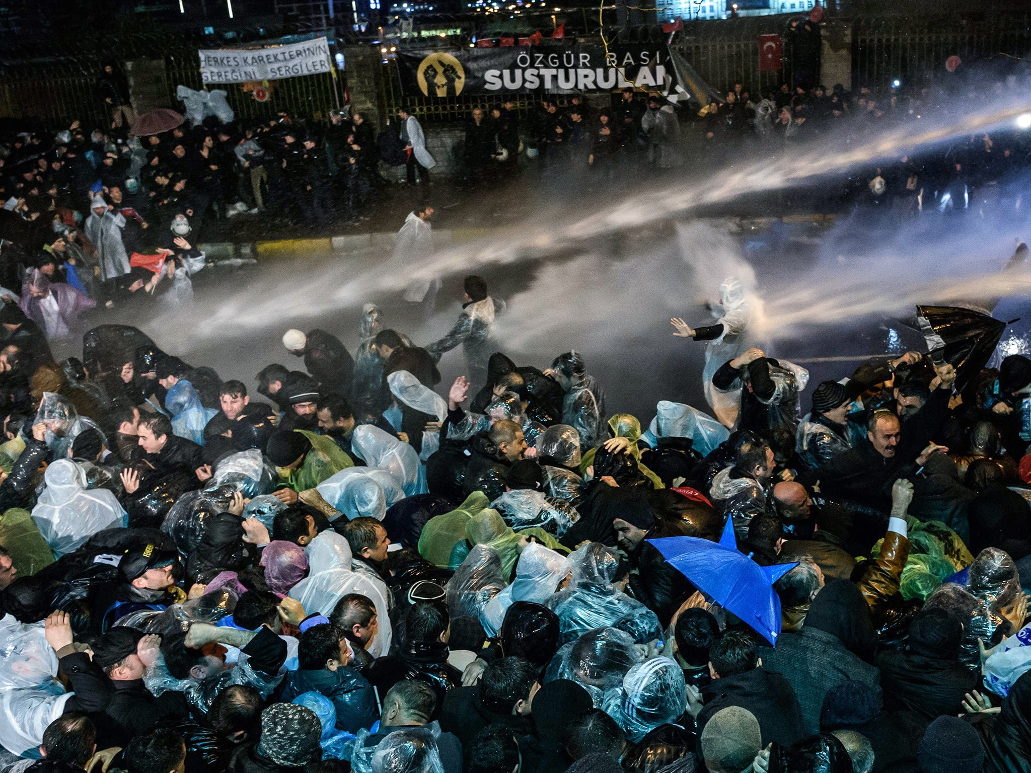 Turkish riot police use water cannon and tear gas to disperse supporters at Zaman daily newspaper headquarters in Istanbul. An Istanbul court ordered into administration a Turkish Zaman daily newspaper that is sharply critical of President Recep Tayyip Erdogan, amid growing alarm over freedom of expression in the country