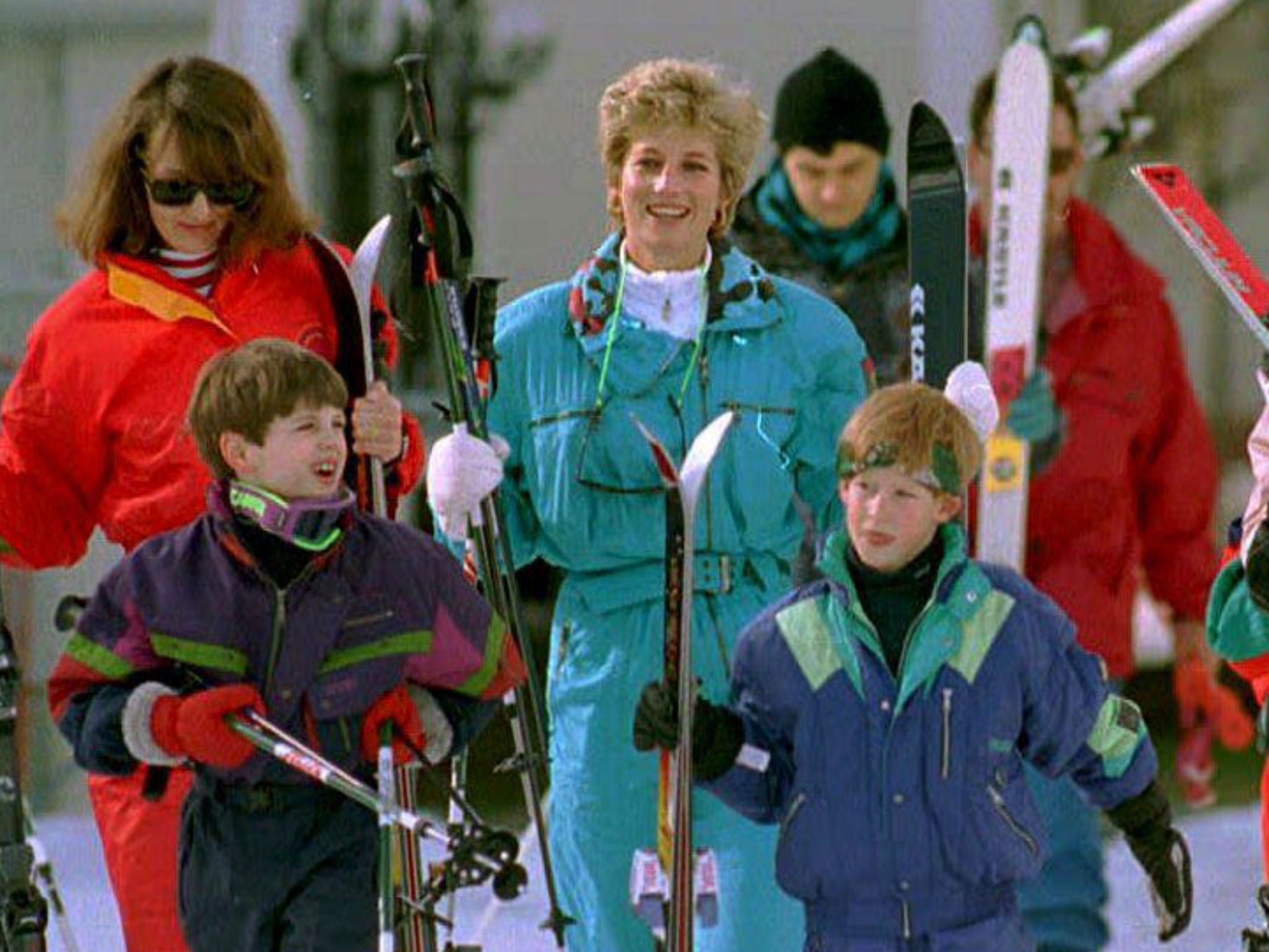 Diana, the Princess of Wales (C), accompanied by Prince Harry (R), family friend Catherine Soames (back L), and her son Harry (L). The Princess and her family arrived for their traditional pre-Easter break at the resort in Lech, Austria