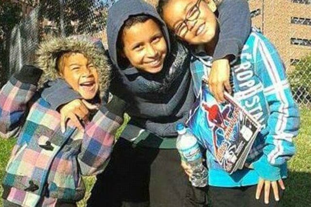Melissa Lightfood said her children - five-year-old Payton (left), 13-year-old Tra'Vaughn (centre)  and eight-year-old Kamryn - suffer from lead poisoning