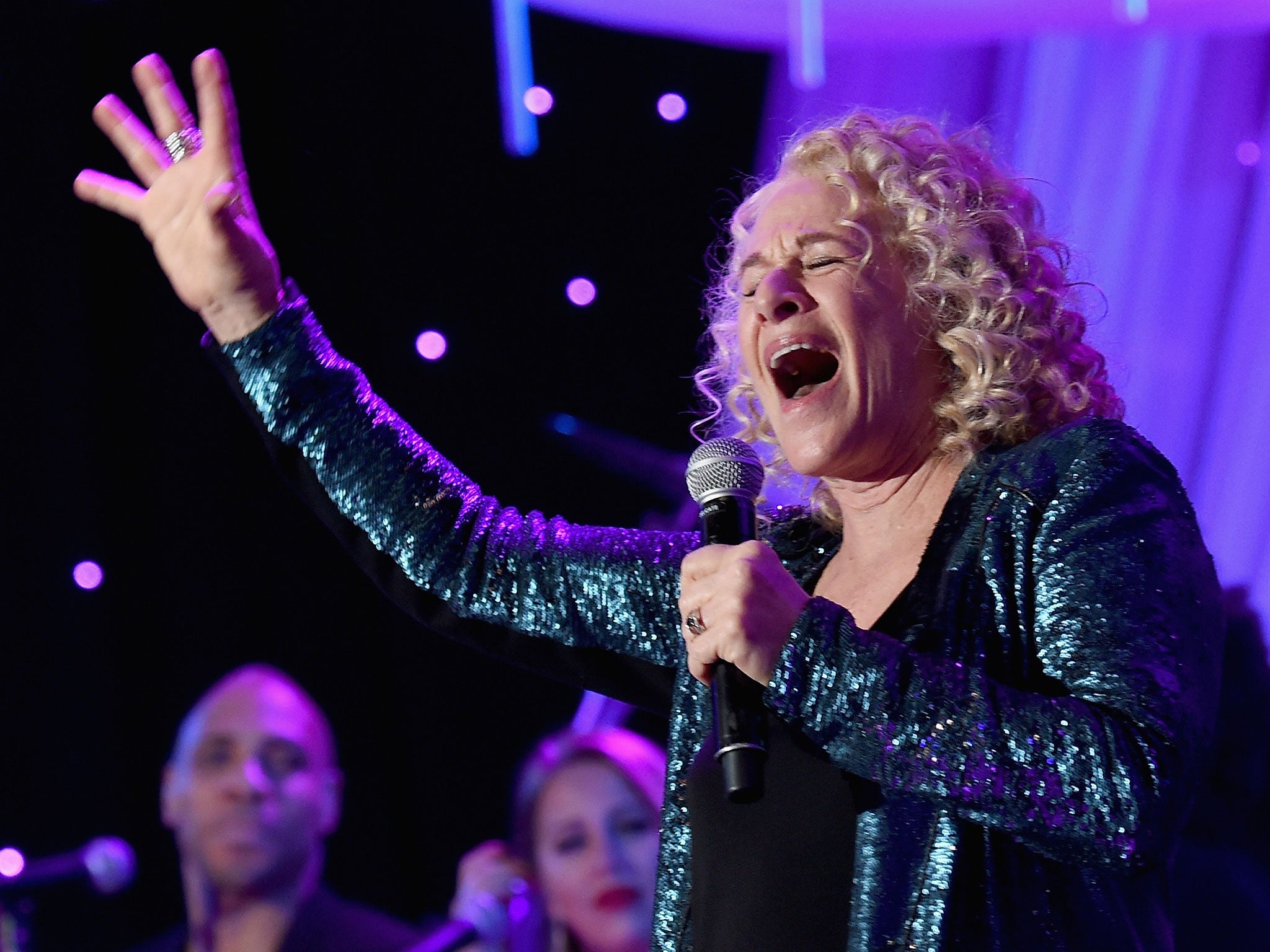 Carole King performing at a pre-Grammy gala in 2015