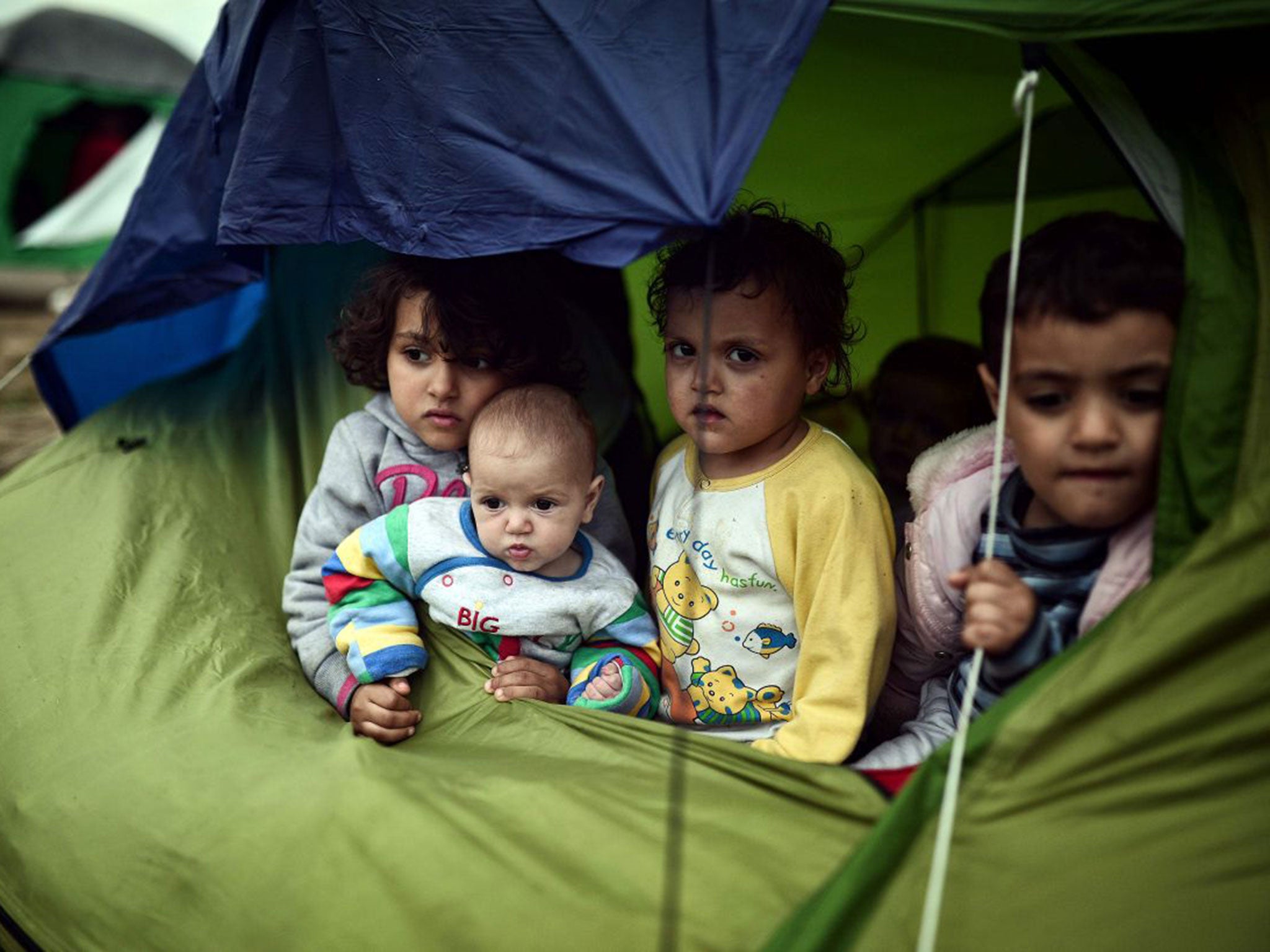 Children in a camp at the Greek-Macedonian border near the village of Idomeni, where thousands of migrants and refugees are stranded