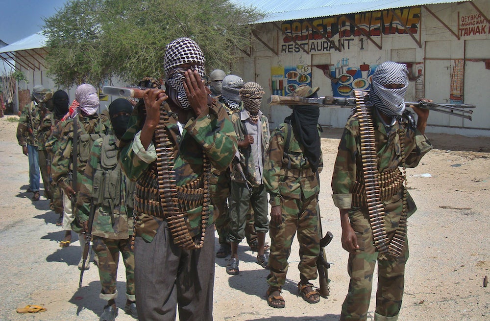 Al-Shabab recruits walk the streets of the Somalian capital, Mogadishu.