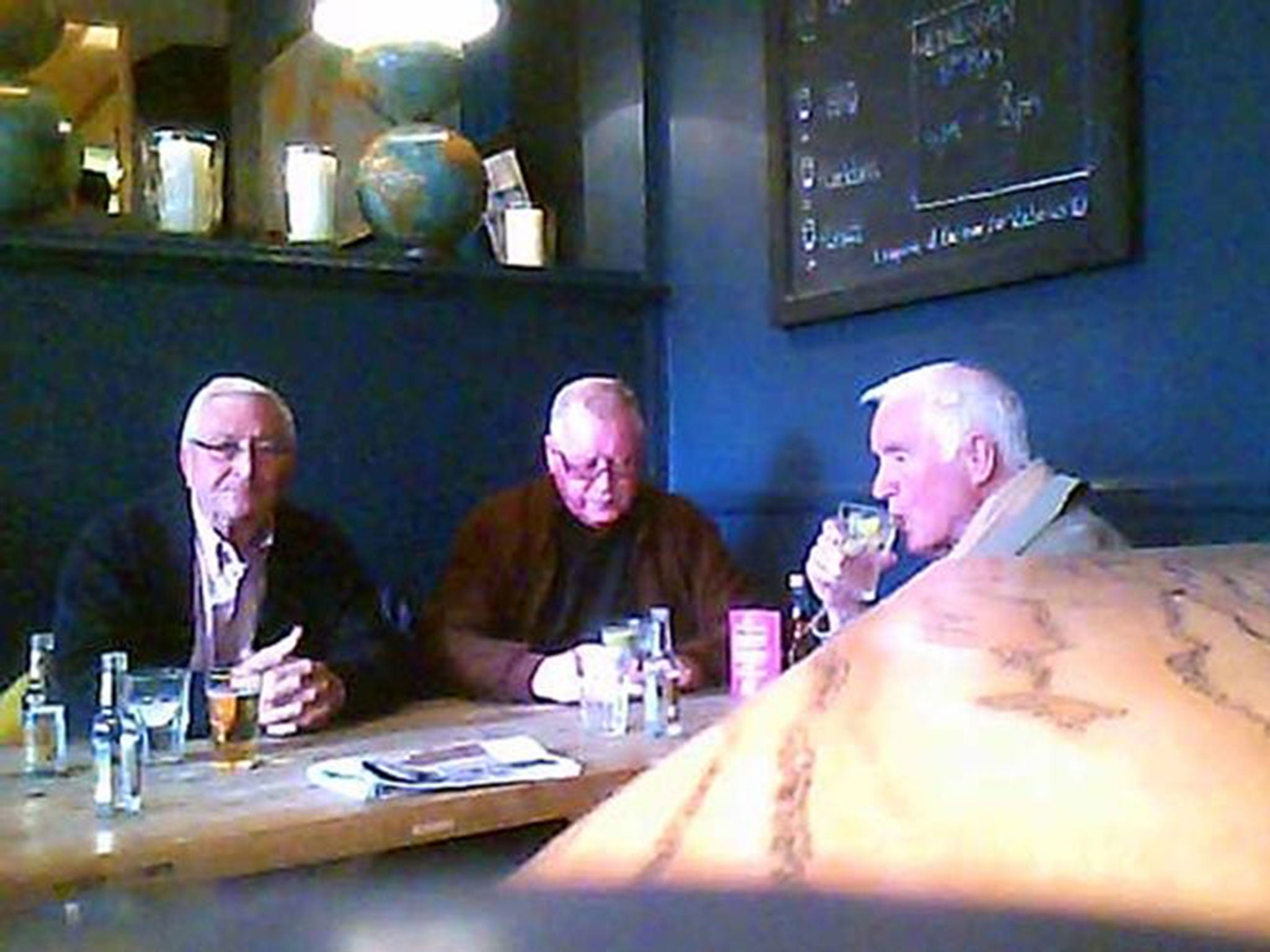 John Collins, Terry Perkins and Brian Reader in a London pub from video surveillance