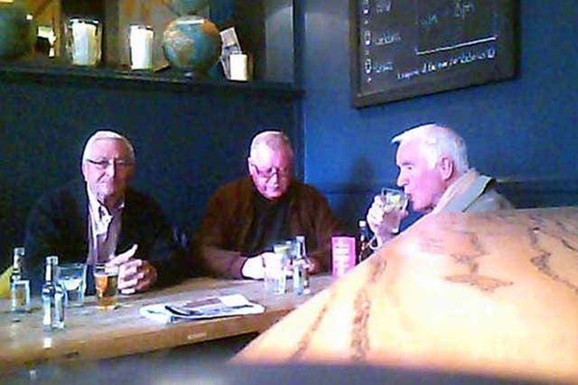 John Collins, Terry Perkins and Brian Reader in a London pub from video surveillance