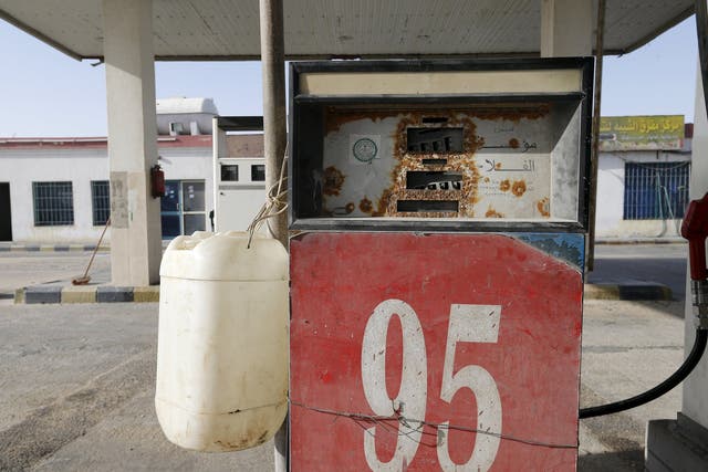 An abandoned fuel pump in the desert village of Salwa, on the Qatar-Saudi border. Retail prices vary widely across the world because of the difference in taxes and subsidies