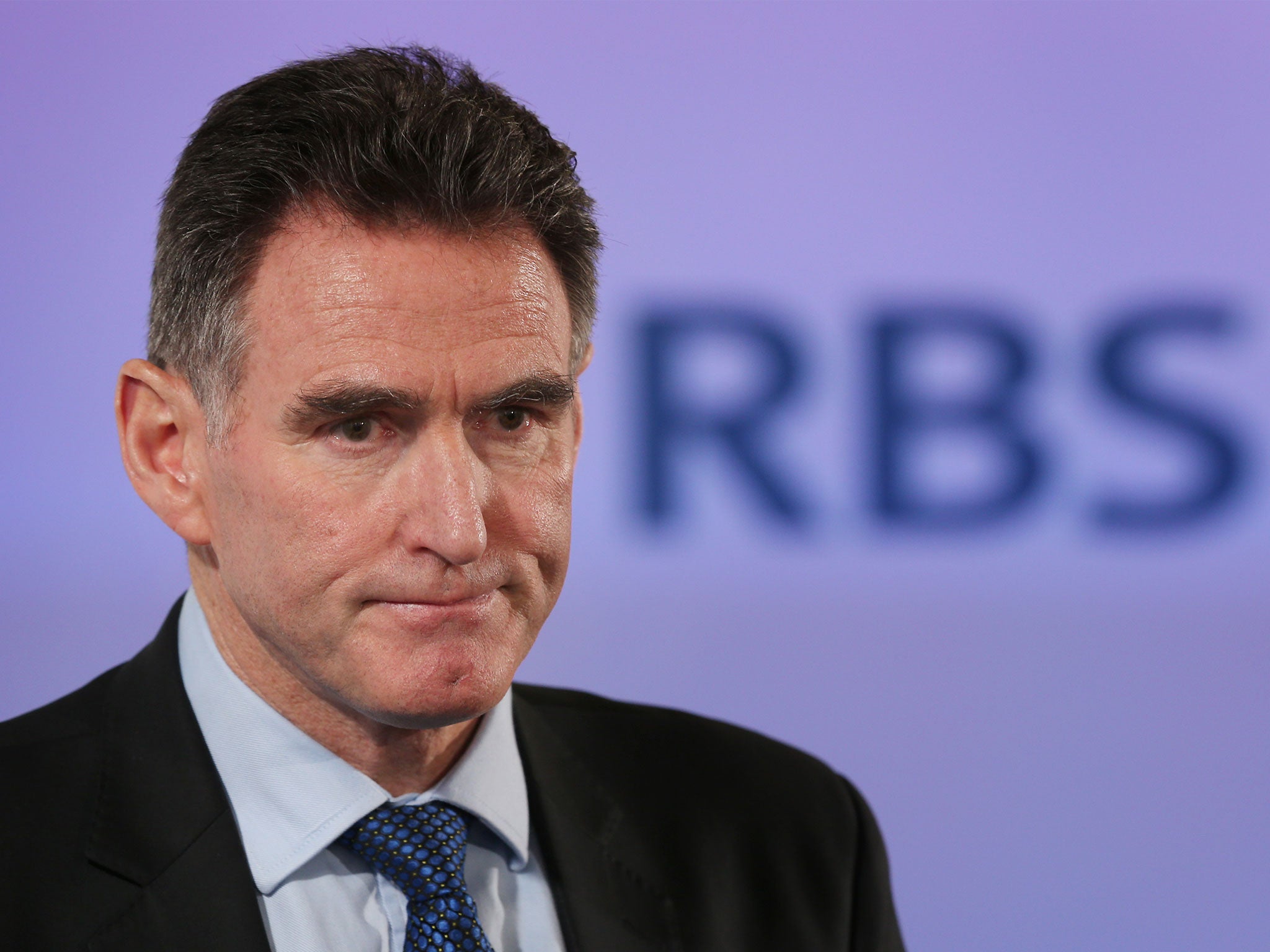 Ross McEwan, CEO of RBS, speaks to reporters and investors in February 2014 following the bank's announcement of a pre-tax loss of £8.2bn for the previous year, the biggest since the bank was rescued by the UK tax payer