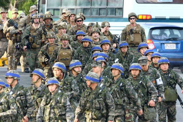 Marines from South Korea, front, and the US, top, before a joint military drill in the port of Pohang
