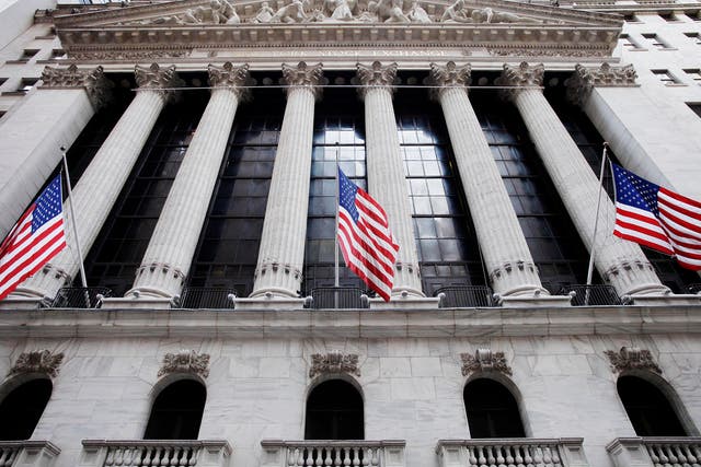 American flags fly in front of the New York Stock Exchange