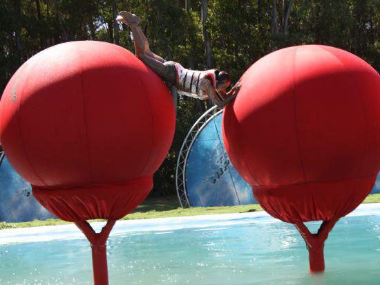 A contestant takes on Total Wipeout's famous Big Red Balls
