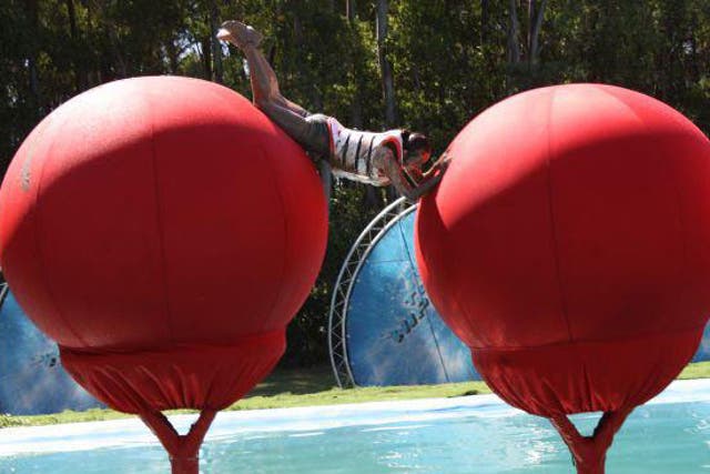 A contestant takes on Total Wipeout's famous Big Red Balls