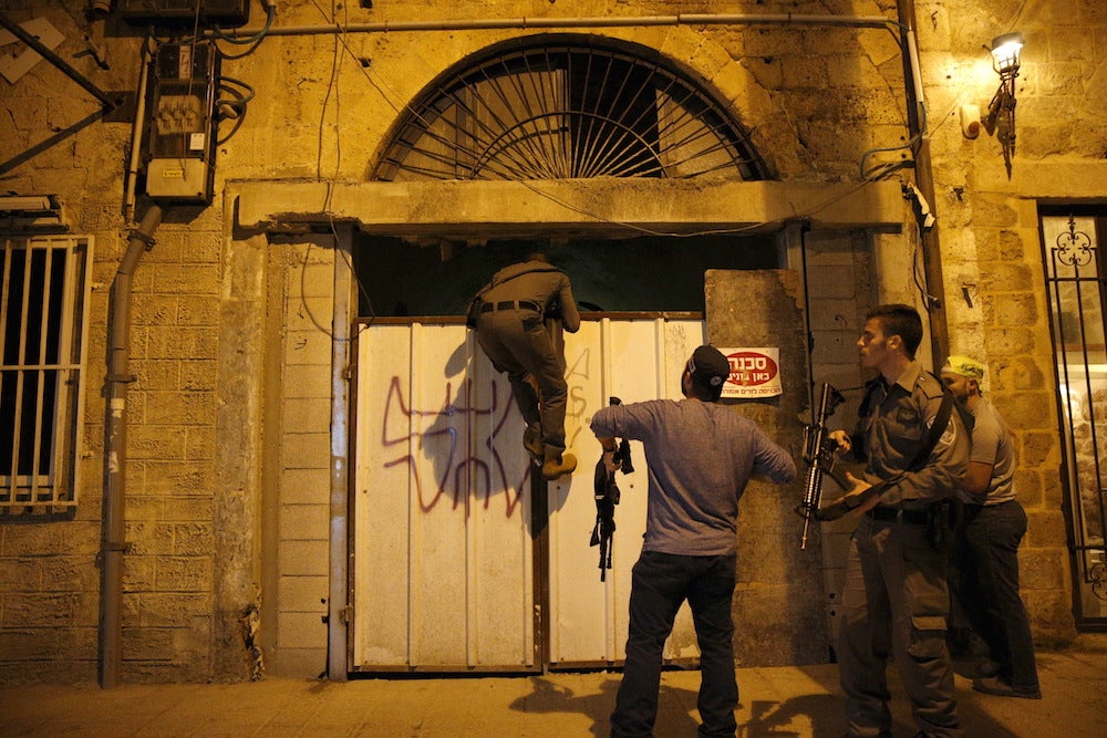 Israeli security forces search the Jaffa port area of Tel Aviv.