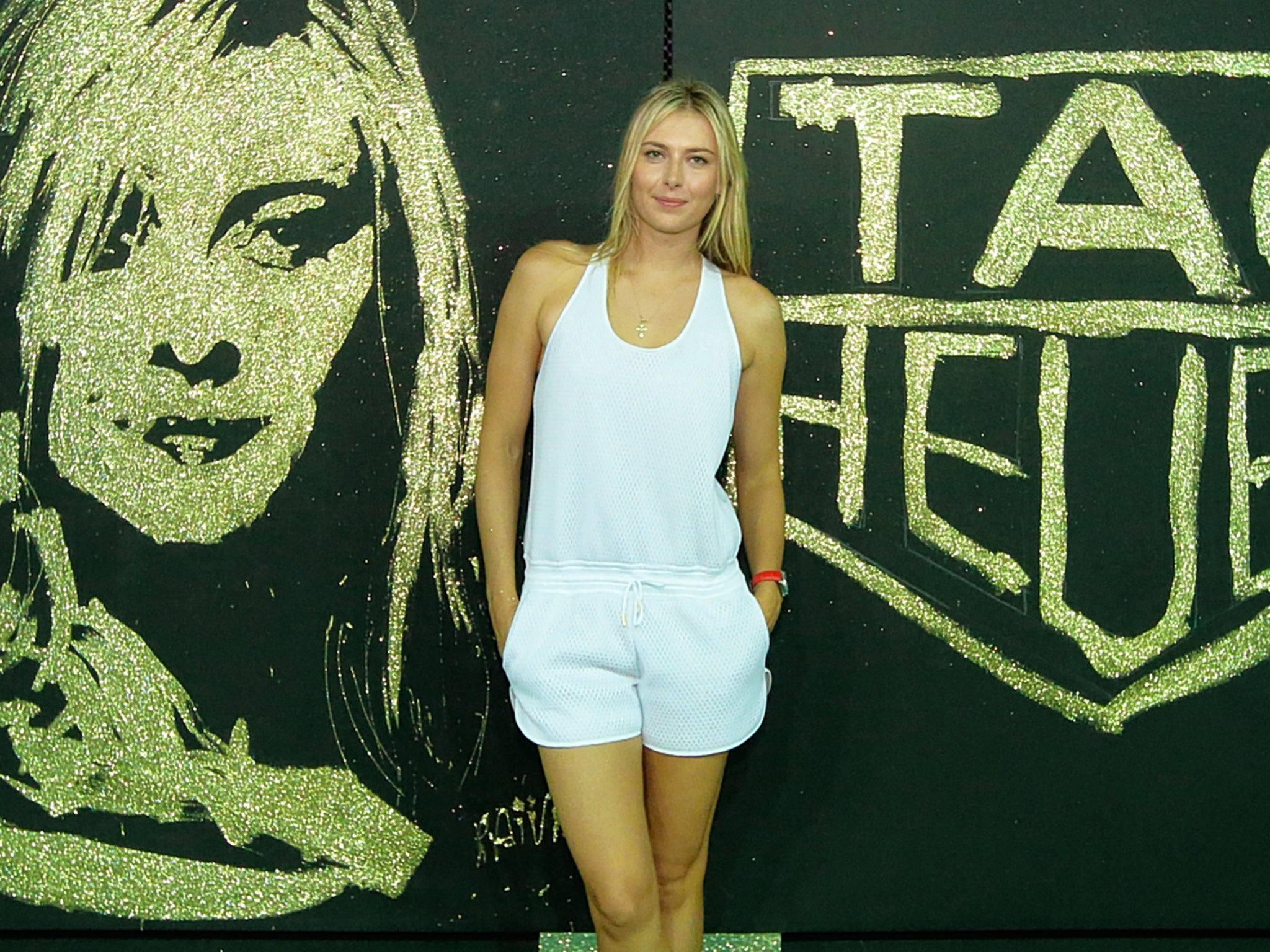 Maria Sharapova poses at a sponsor's event