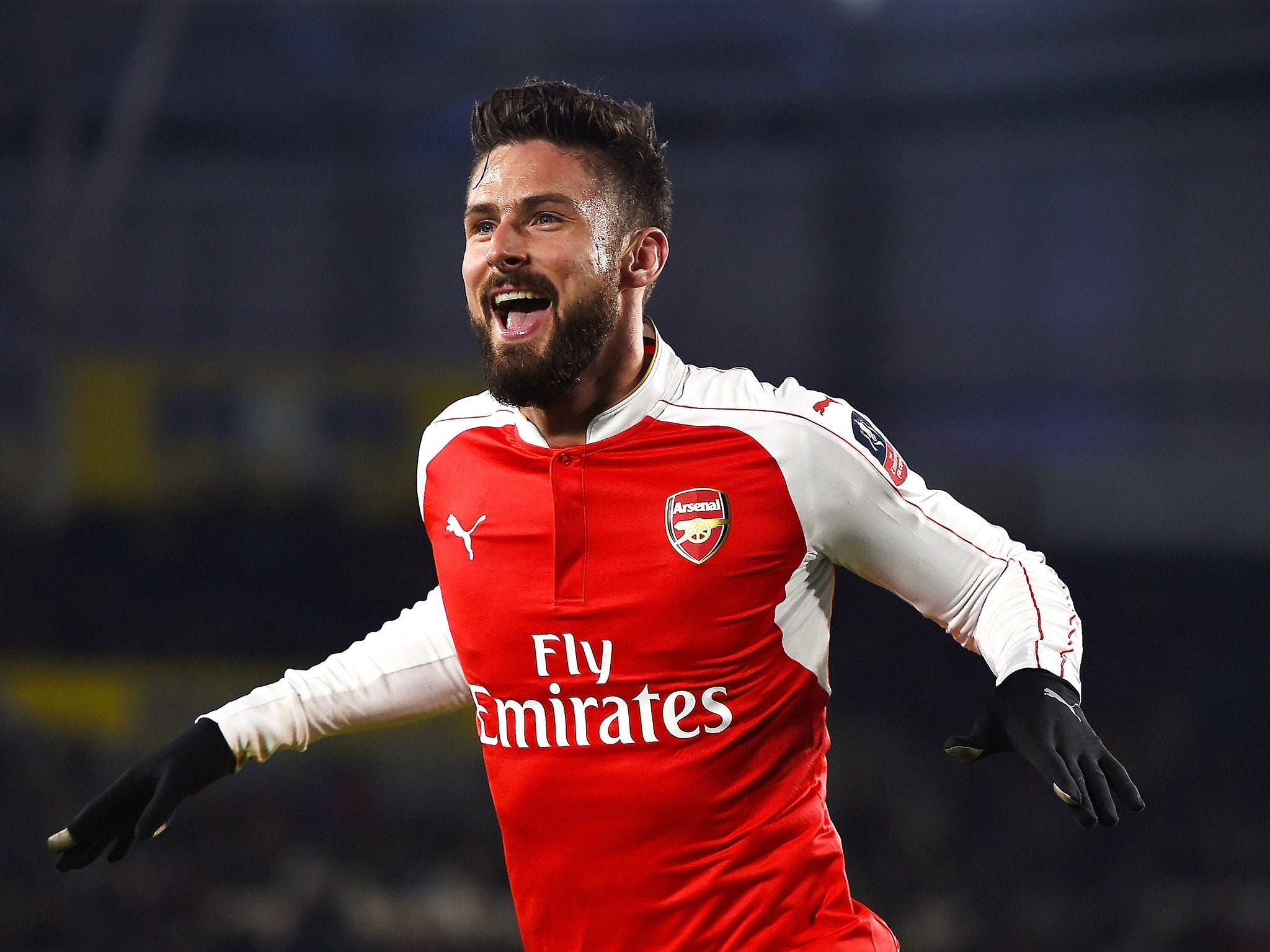 Olivier Giroud celebrates his first goal against Hull on Tuesday night