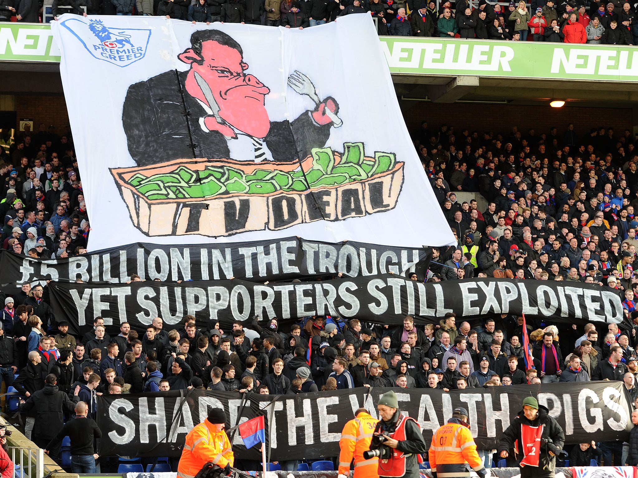 Crystal Palace supporters display banners in protest against high ticket prices