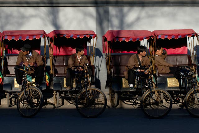 The word 'rickshaw' derives from which language?