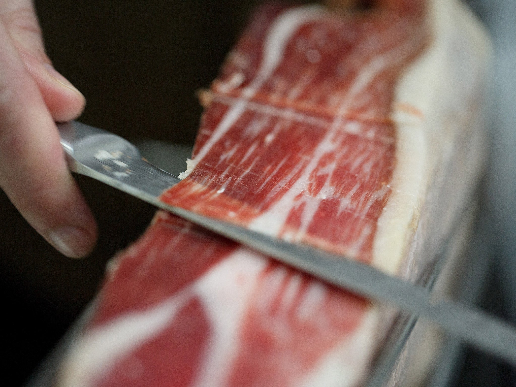 Game changer: the processing of raw food, such as slicing meat, could have enabled humans to evolve into the world’s first truly intelligent species (Getty)