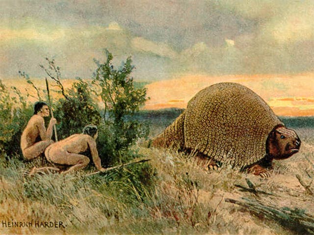 Stone Age hunters track a Glyptodon, a species that was eventually hunted to extinction