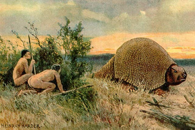 Stone Age hunters track a Glyptodon, a species that was eventually hunted to extinction