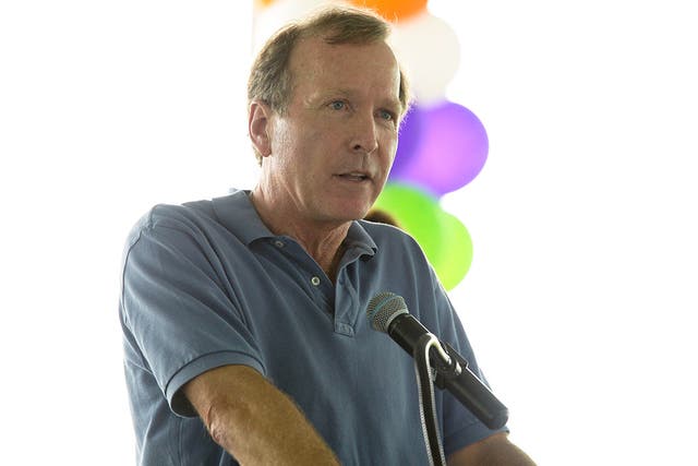 Neil Bush pictured giving a speech in Los Angeles, California, last year