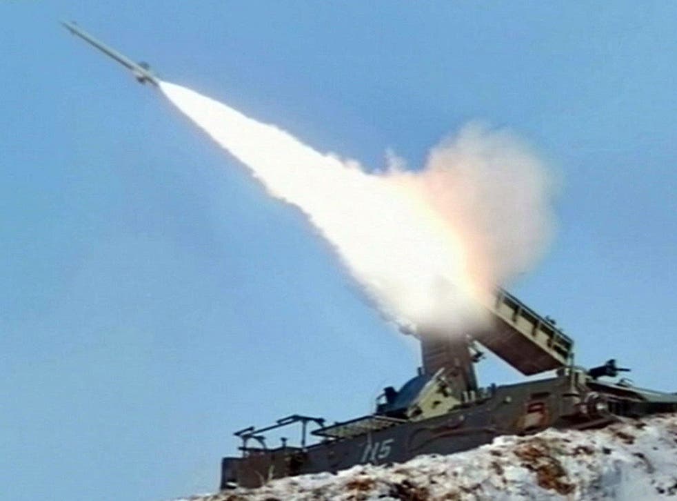 A missile is launched during a North Korean military drill in 2013