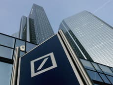Deutsche Bank posts surprise profit despite threat of $14bn fine