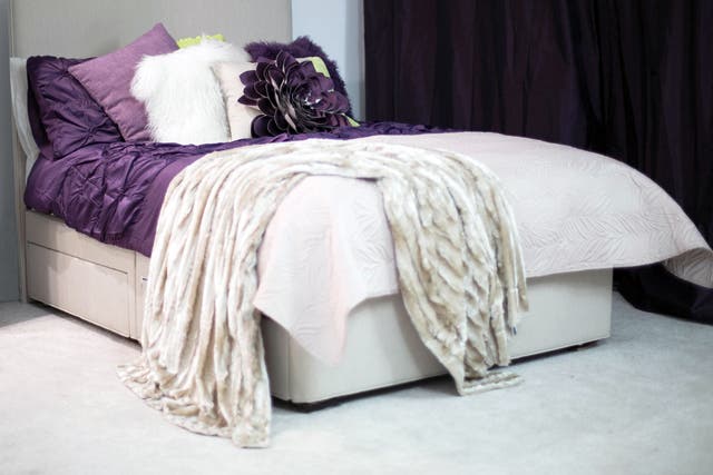 Dressed to impress: purple, green and cream bedding translates neatly between the season