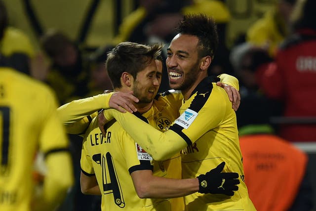 Borussia Dortmund striker Pierre Emerick Aubameyang celebrates with his team-mates