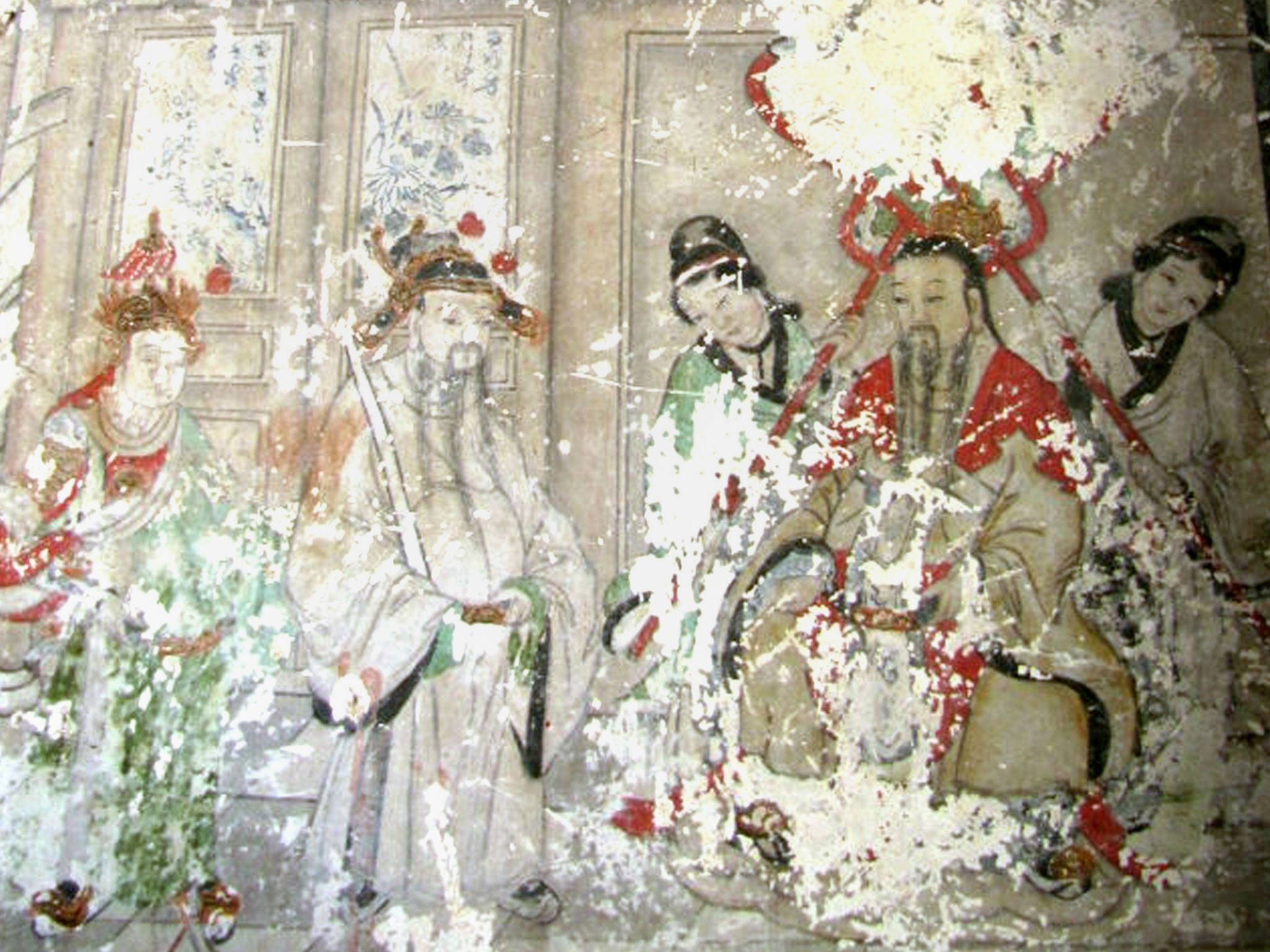 One of the ancient frescos that are currently covered by cartoon-like paintings in Yunjie Temple in Chaoyang