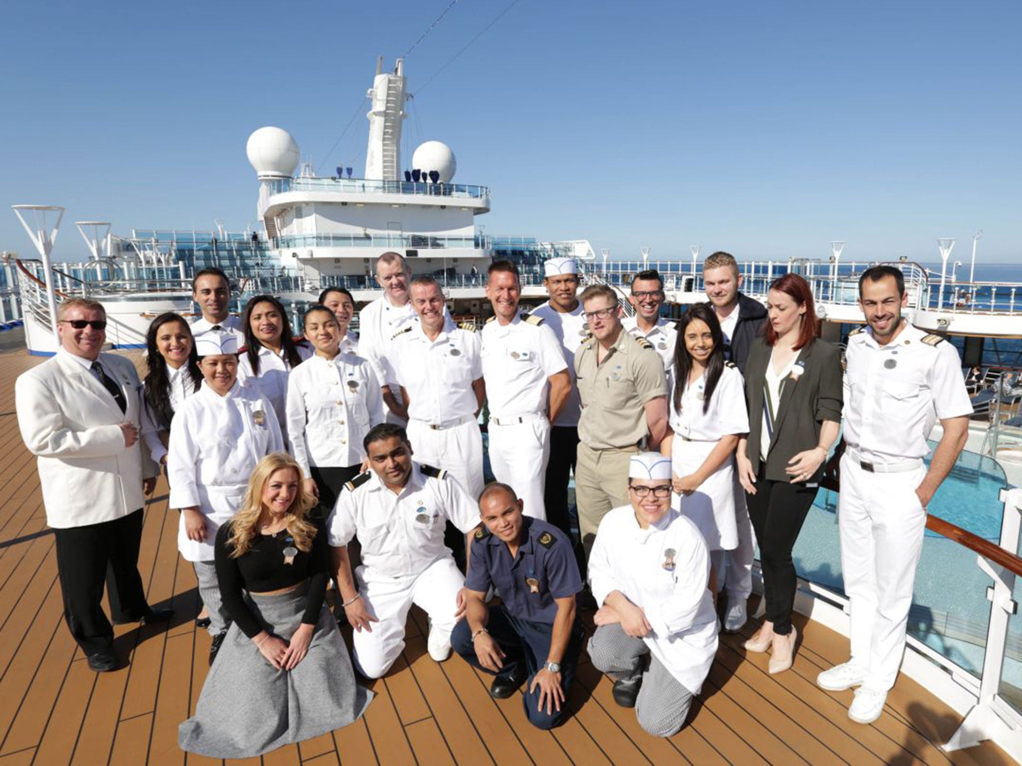 The crew of the Regal Princess on deck in ITV's 'The Cruise'