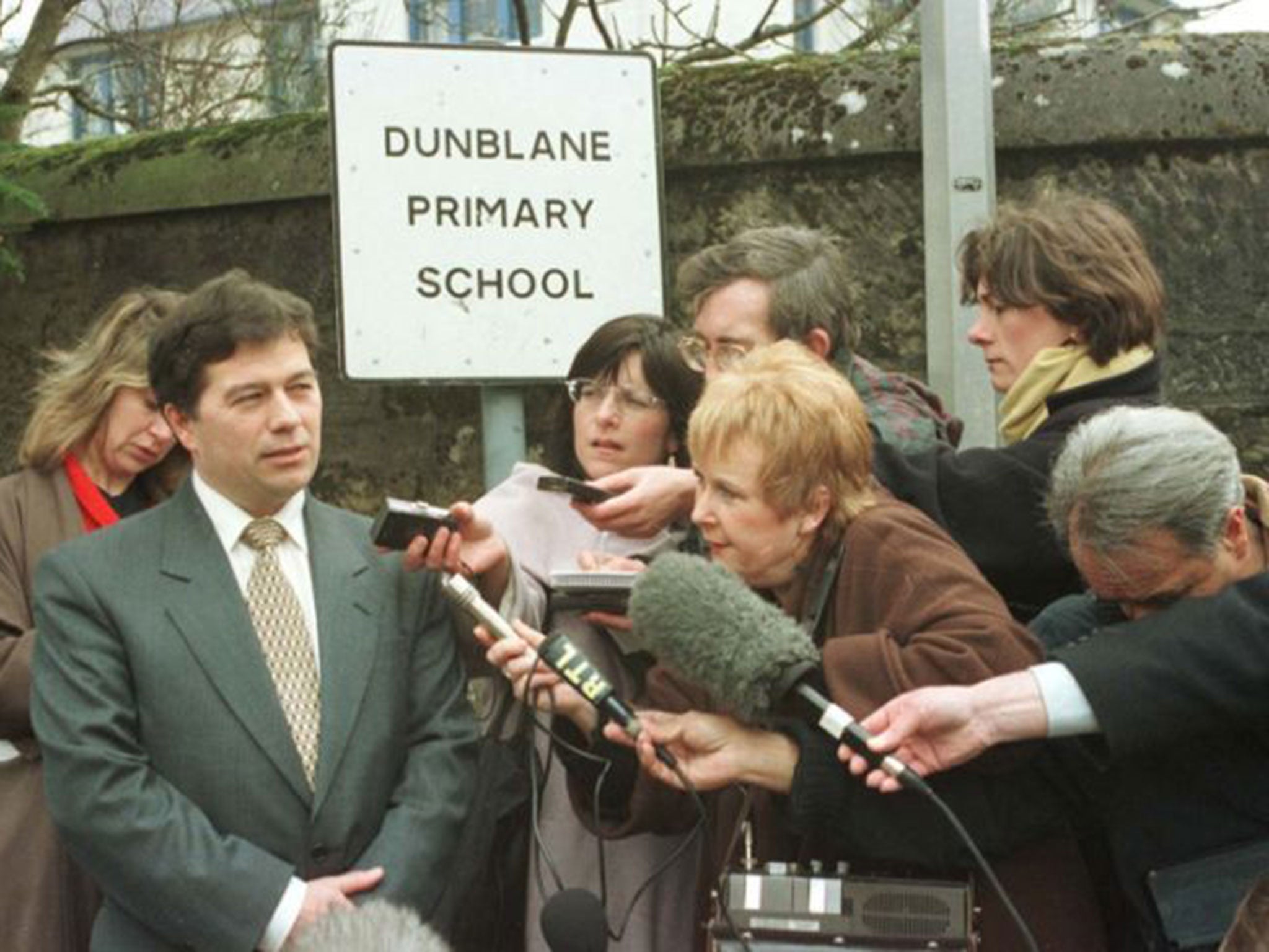 &#13;
Head teacher Ron Taylor speaking to reporters on the day pupils returned to school after the Dunblane massacre &#13;