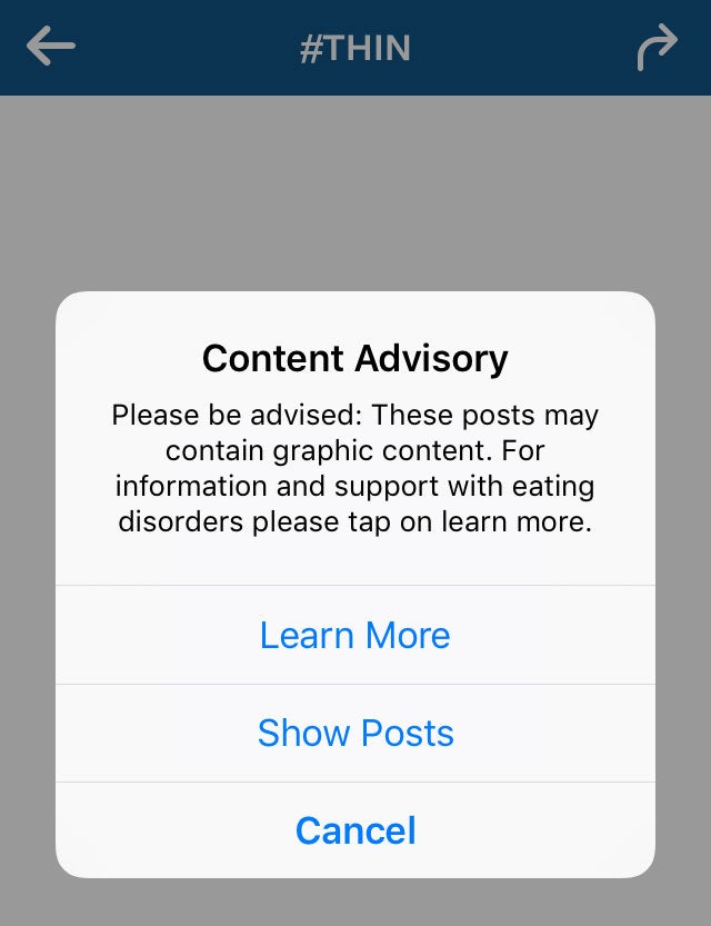 The warning which appears when you search for the #thin hashtag on Instagram