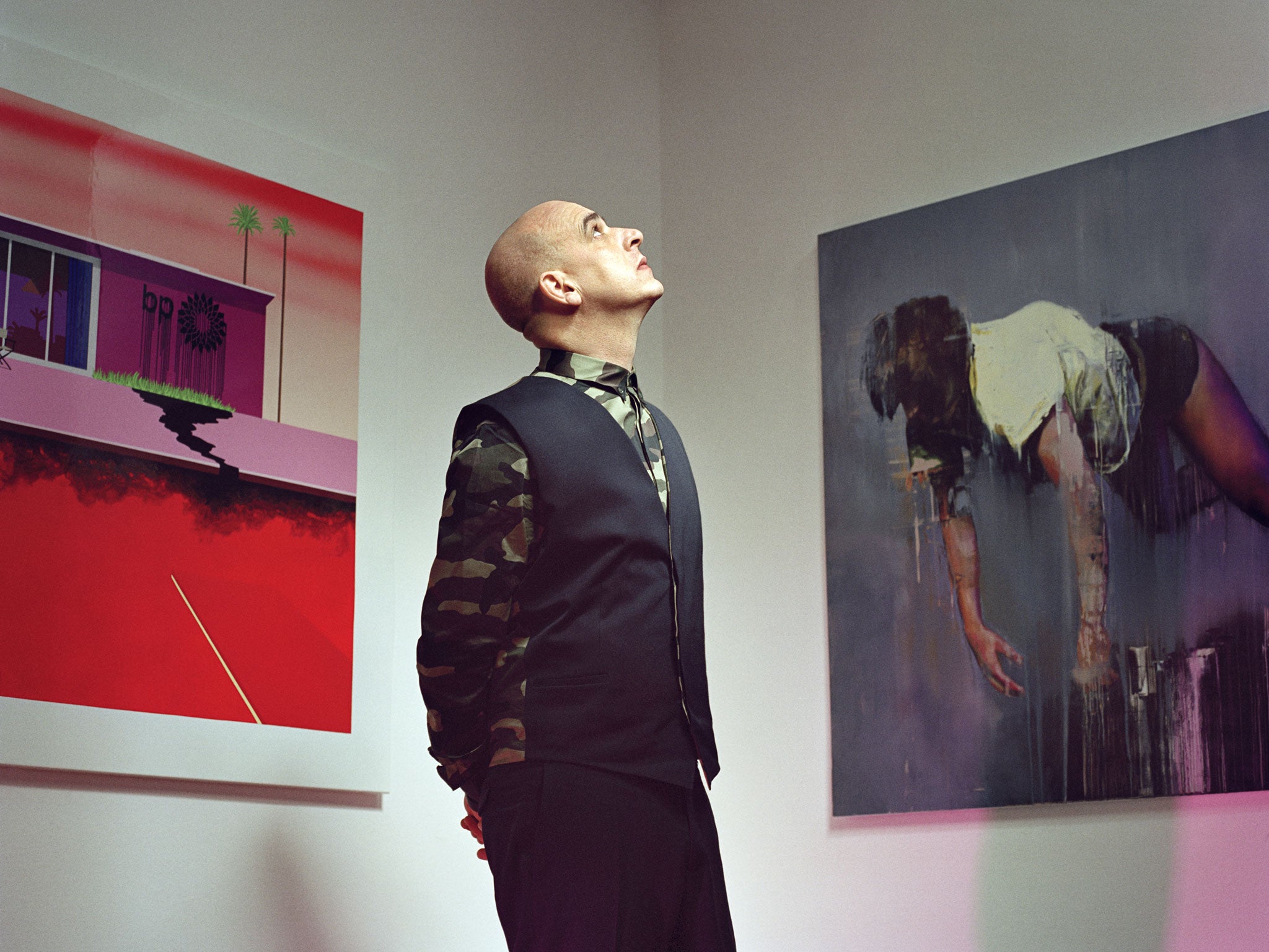 Two gallery assistants pose with Air Power by Jean-Michel Basquiat  News Photo - Getty Images