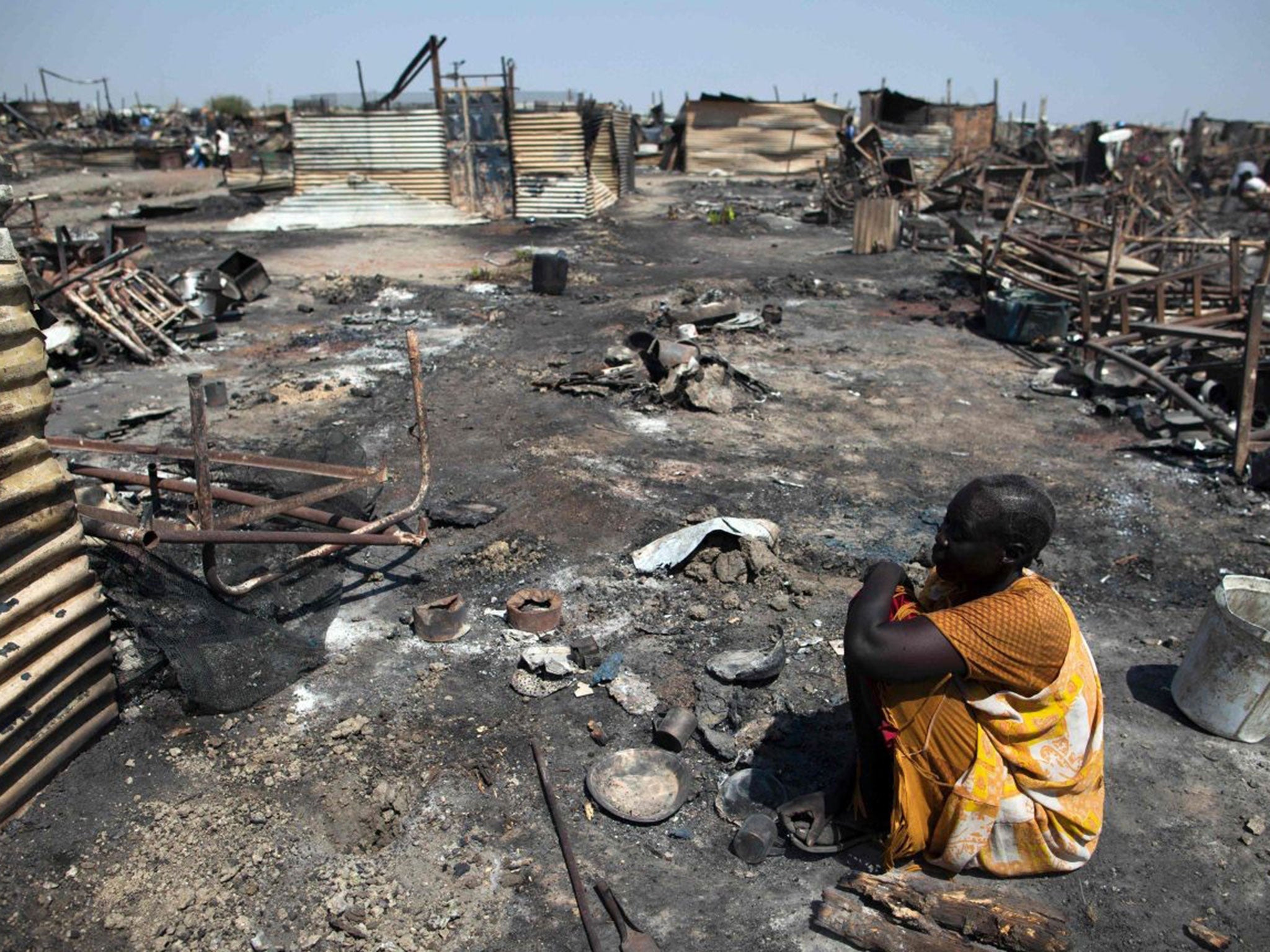 A displaced woman in a Protection of Civilians (PoC) site in Malakal, where 25 were killed and 120 wounded when soldiers attacked burned a UN camp on March 4, 2016.