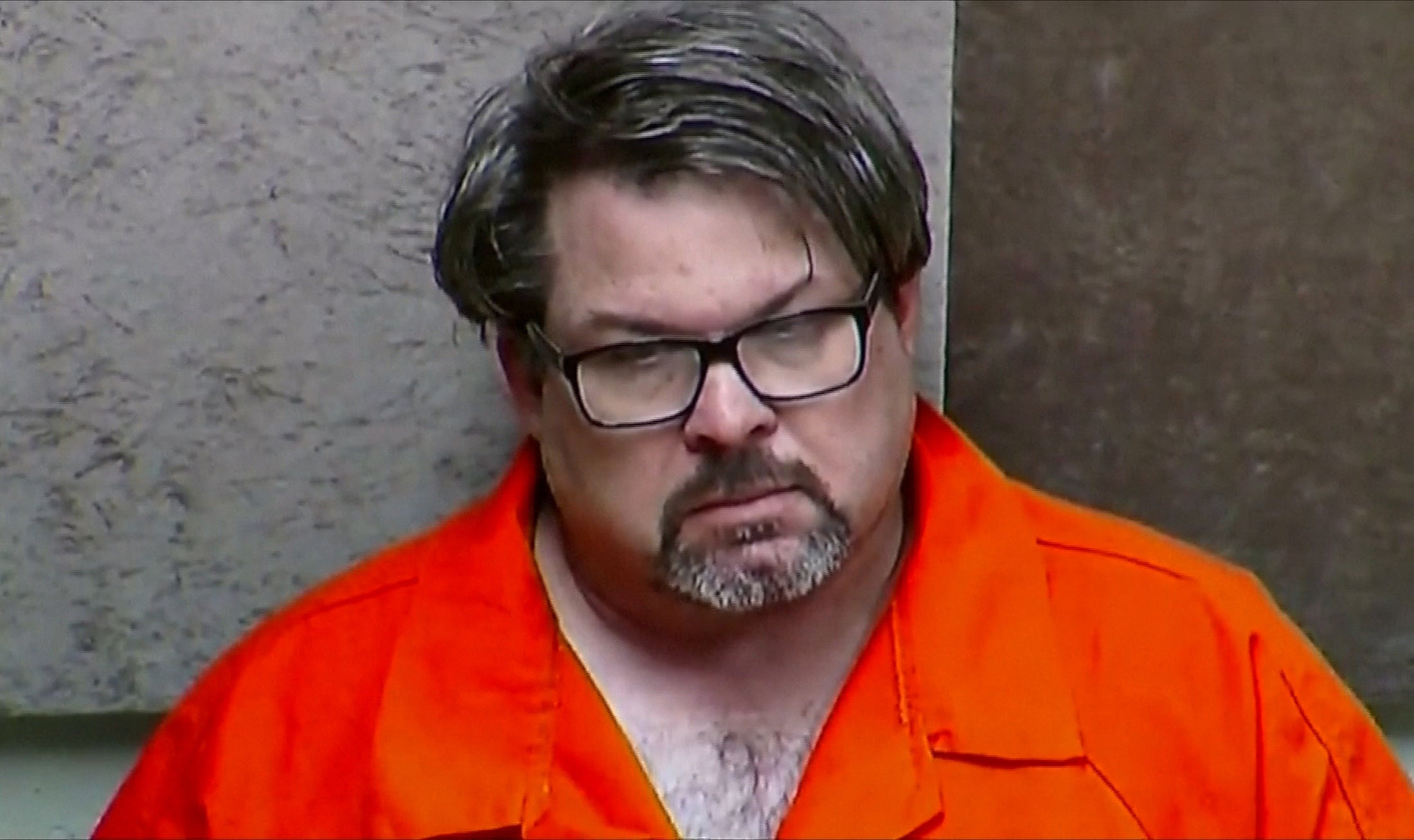 Uber driver Jason Dalton, suspected of killing six people and wounding two others, is seen on closed circuit television during his arraignment in Kalamazoo County, Michigan
