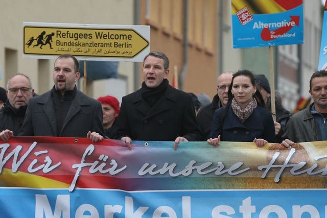 Björn Höcke (centre) marches with AfD members in Raguhn earlier this month