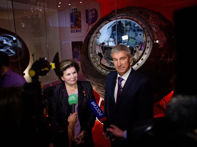 Dr Valentina Tereshkova, the first woman in space  with fellow cosmonaut Sergei Krikalev  in front of the Vostok 6 capsule at the Science Museum