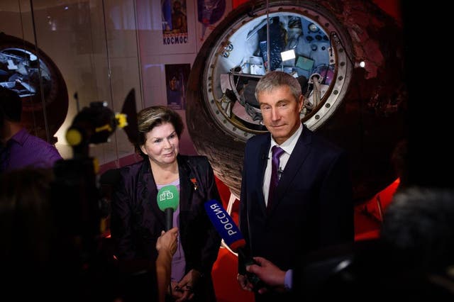Dr Valentina Tereshkova, the first woman in space  with fellow cosmonaut Sergei Krikalev  in front of the Vostok 6 capsule at the Science Museum