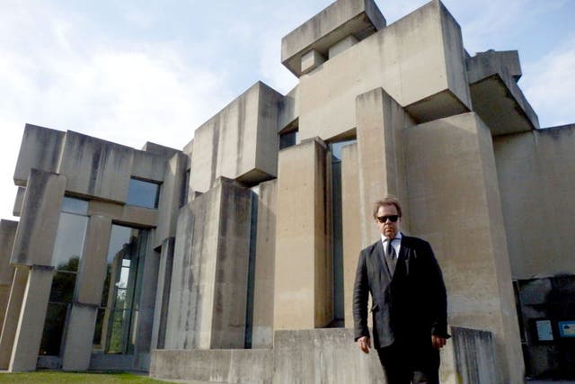 Jonathan Meades, a fan of brutalist architecture, seen here at Wotruba Church in Vienna