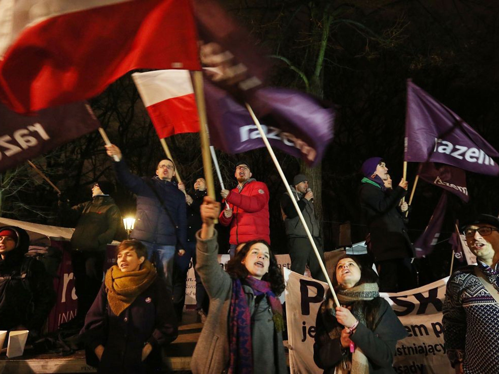 Protesters gather in Warsaw to oppose reforms that have been deemed illegal by Poland’s Constitutional Court