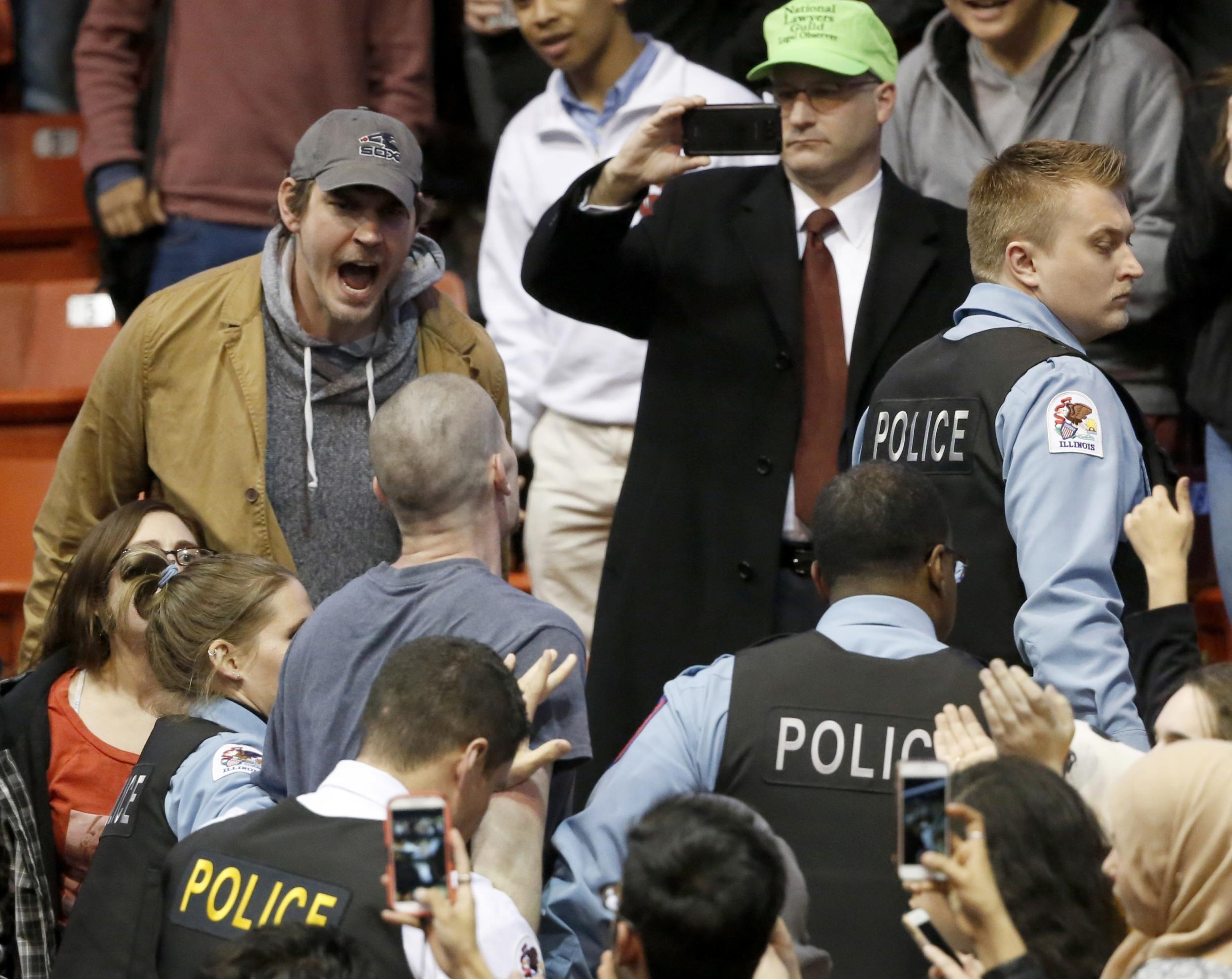 Police begin to clear the arena