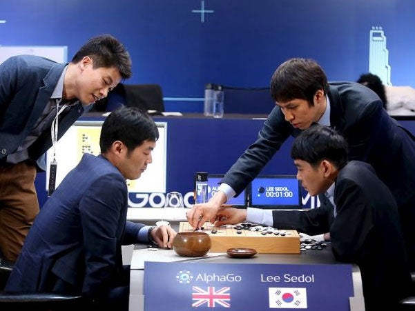 The world's top Go player Lee Sedol reviews the match after the third match of the Google DeepMind Challenge Match against Google's artificial intelligence program AlphaGo Reuters