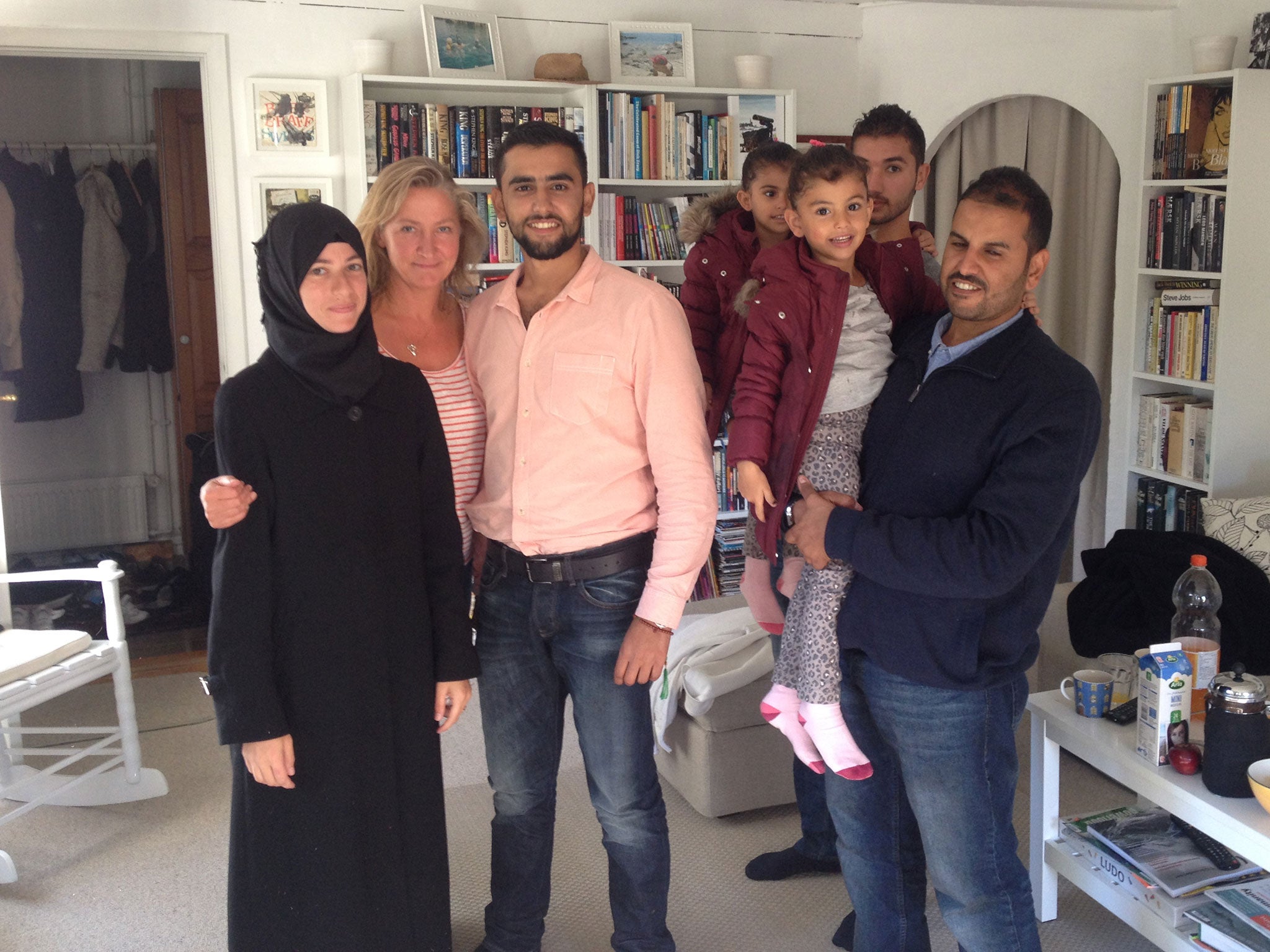 Lisbeth Zornig with the family of Syrian refugees she drove from Rodby to Copenhagen on 7 September 2015