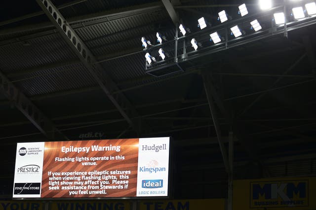 The jumbo screen at Arsenal's Emirates stadium gives an epilepsy warning ahead of a recent FA Cup match. The Epilepsy Society says almost four in 10 epilepsy-related deaths are avoidable