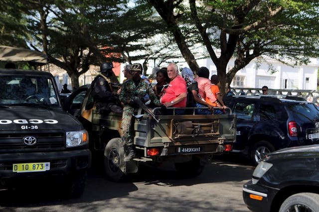 Security forces evacuate people in Bassam, Ivory Coast